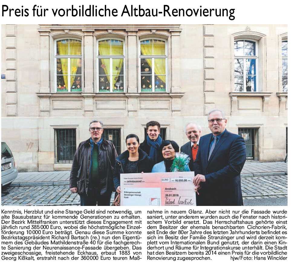 Zeitungsausschnitt mit Bild und Text