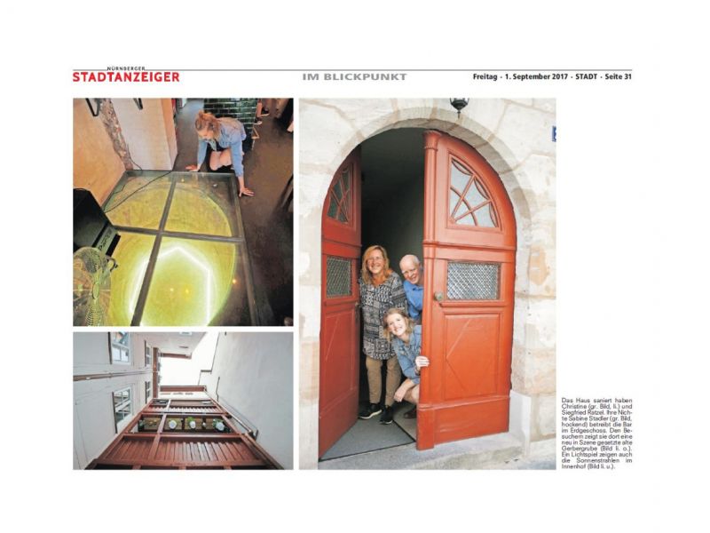 Zeitungsauschnitt mit Bildern und Text